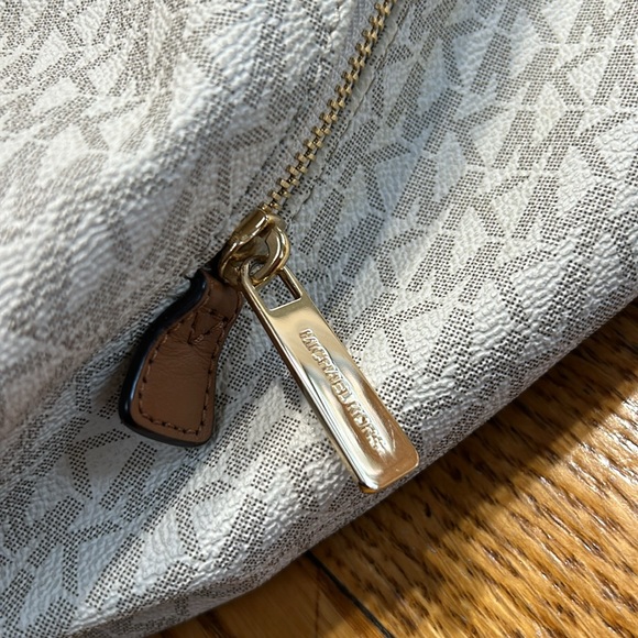 Michael Kors handbag. Vanilla color with tan straps and gold hardware. - Picture 6 of 16